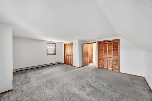 an empty room with sliding door