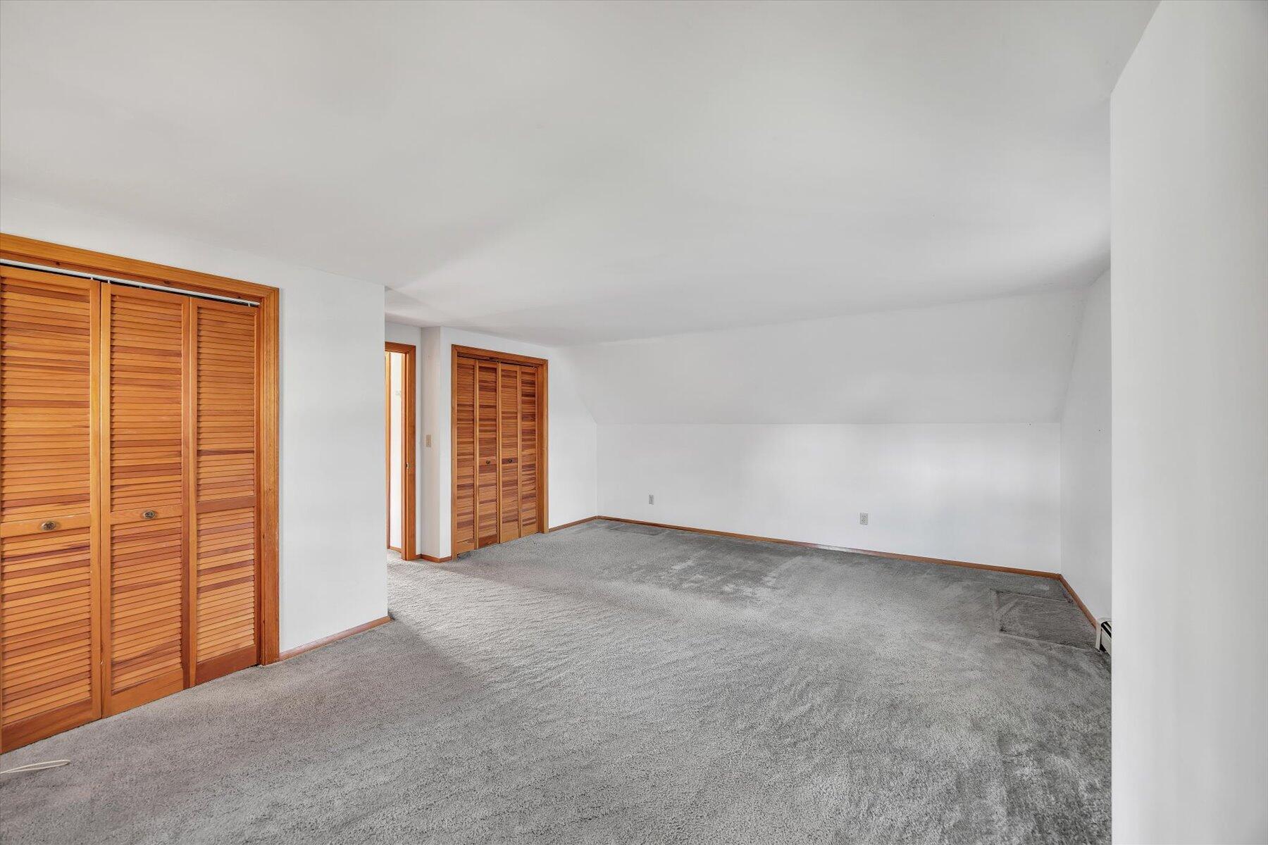 360 Airline Road South Dennis, MA 02660 - Photo 28 of 30 an empty room with sliding door