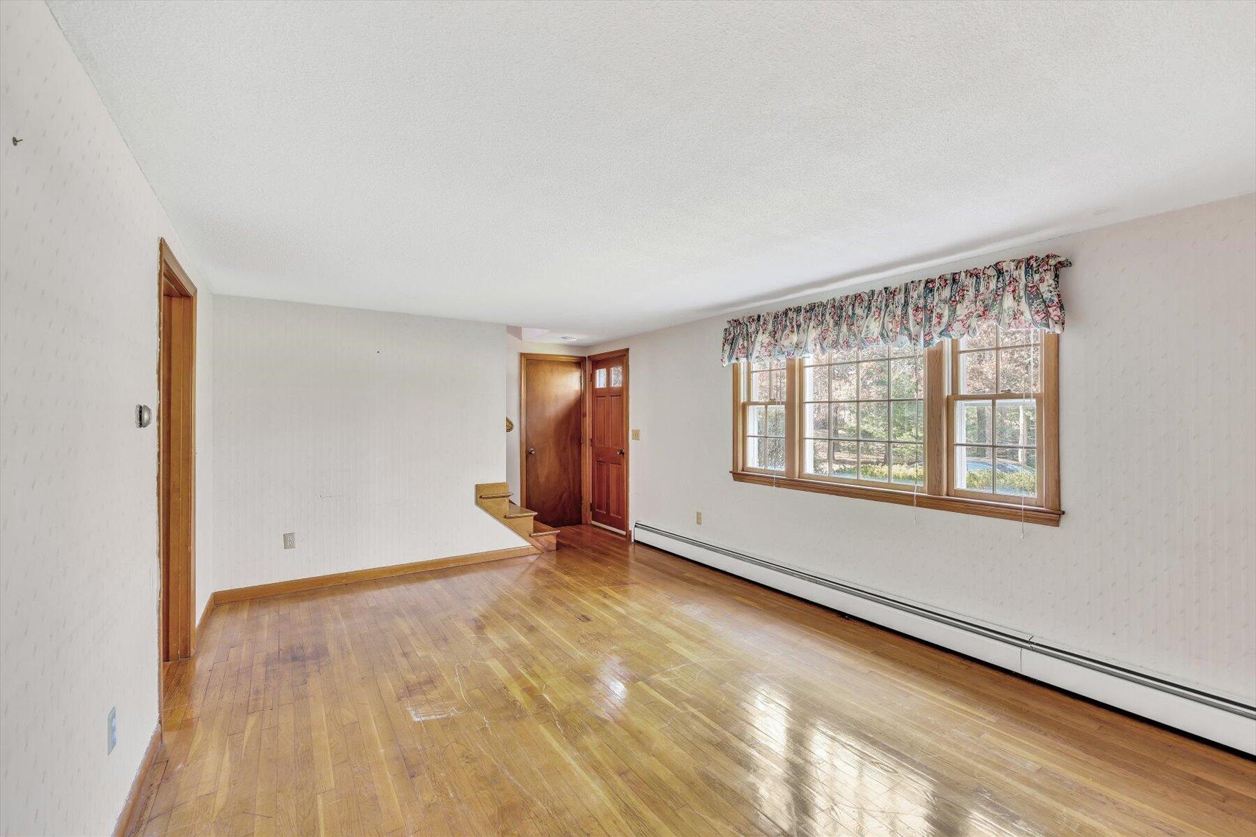 360 Airline Road South Dennis, MA 02660 - Photo 7 of 30 an empty room with windows