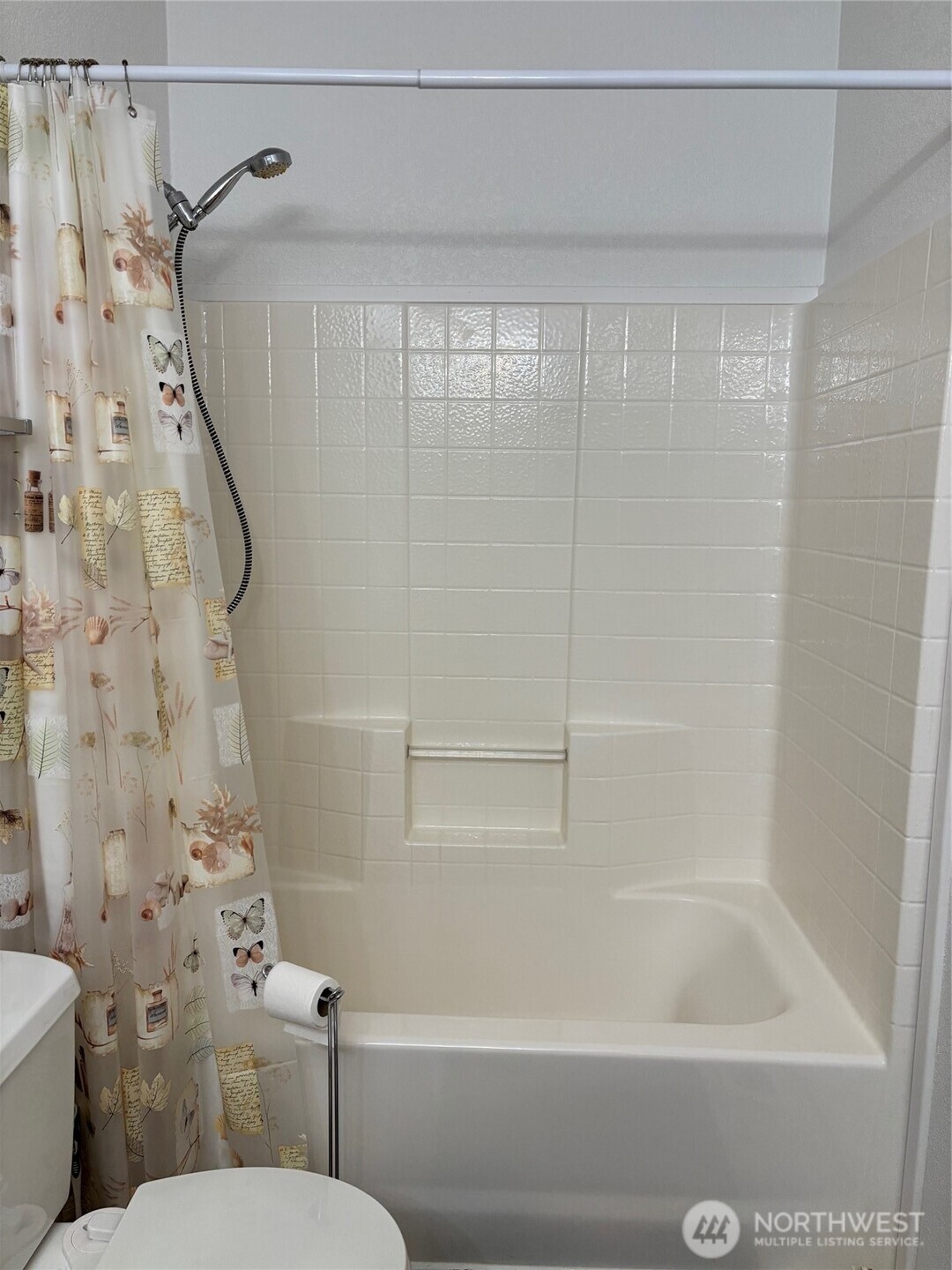 8370 Harborview Road, Unit 7 Blaine, WA 98230 - Photo 17 of 29 a bathroom with a shower and a toilet