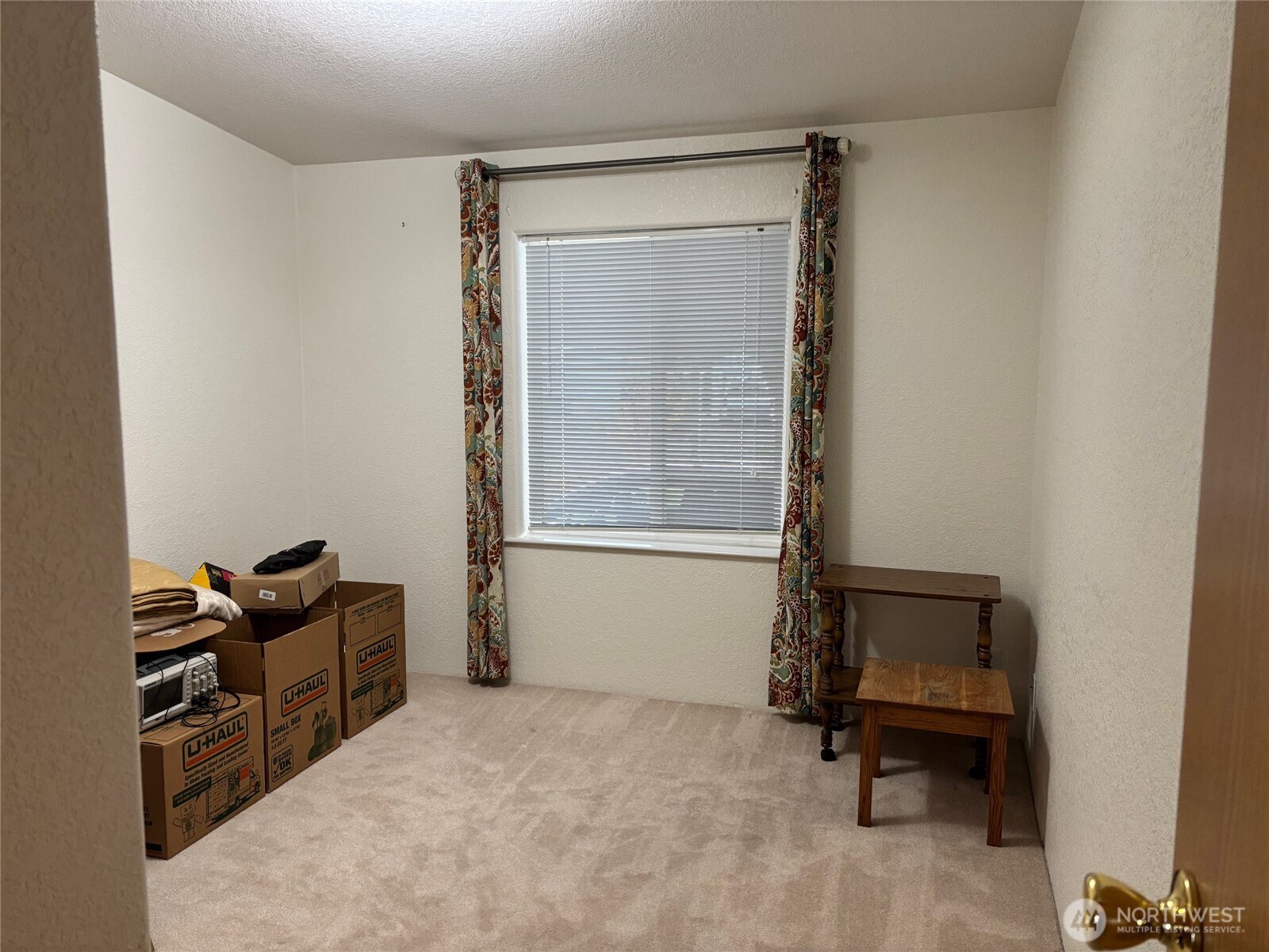 8370 Harborview Road, Unit 7 Blaine, WA 98230 - Photo 18 of 29 a bedroom with a bed and a window