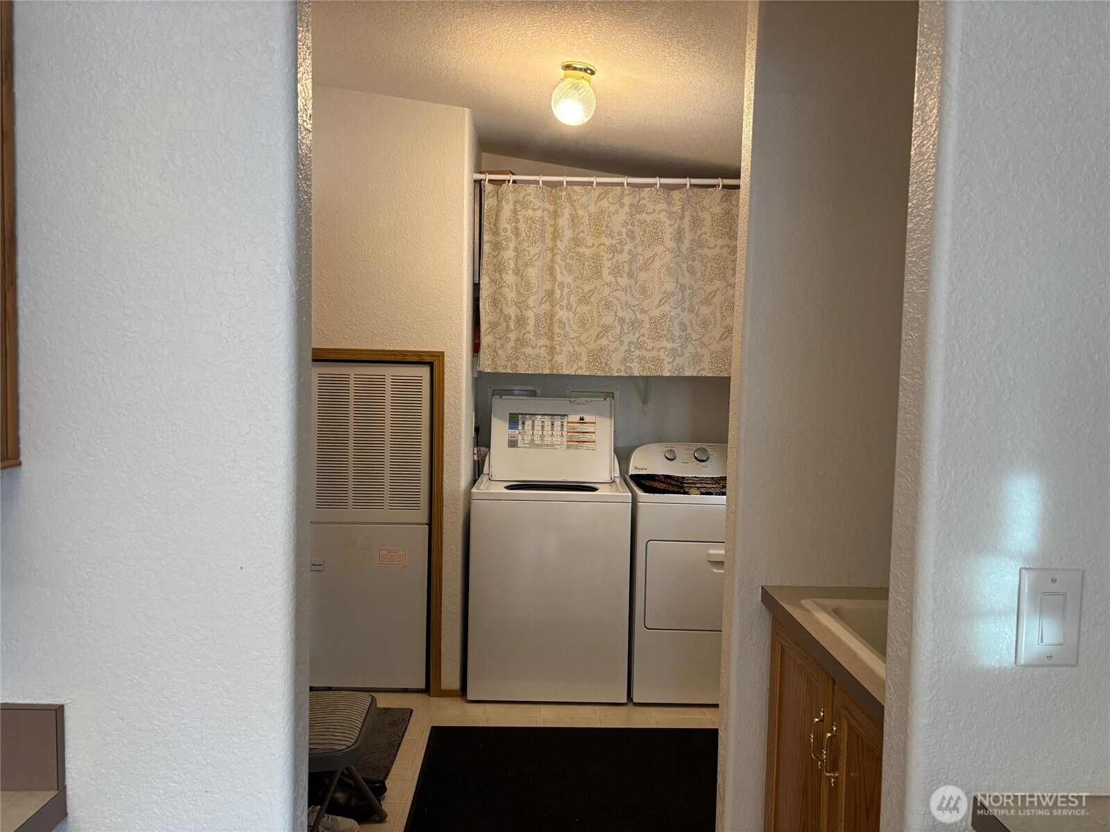 8370 Harborview Road, Unit 7 Blaine, WA 98230 - Photo 22 of 29 a close view of washer and dryer