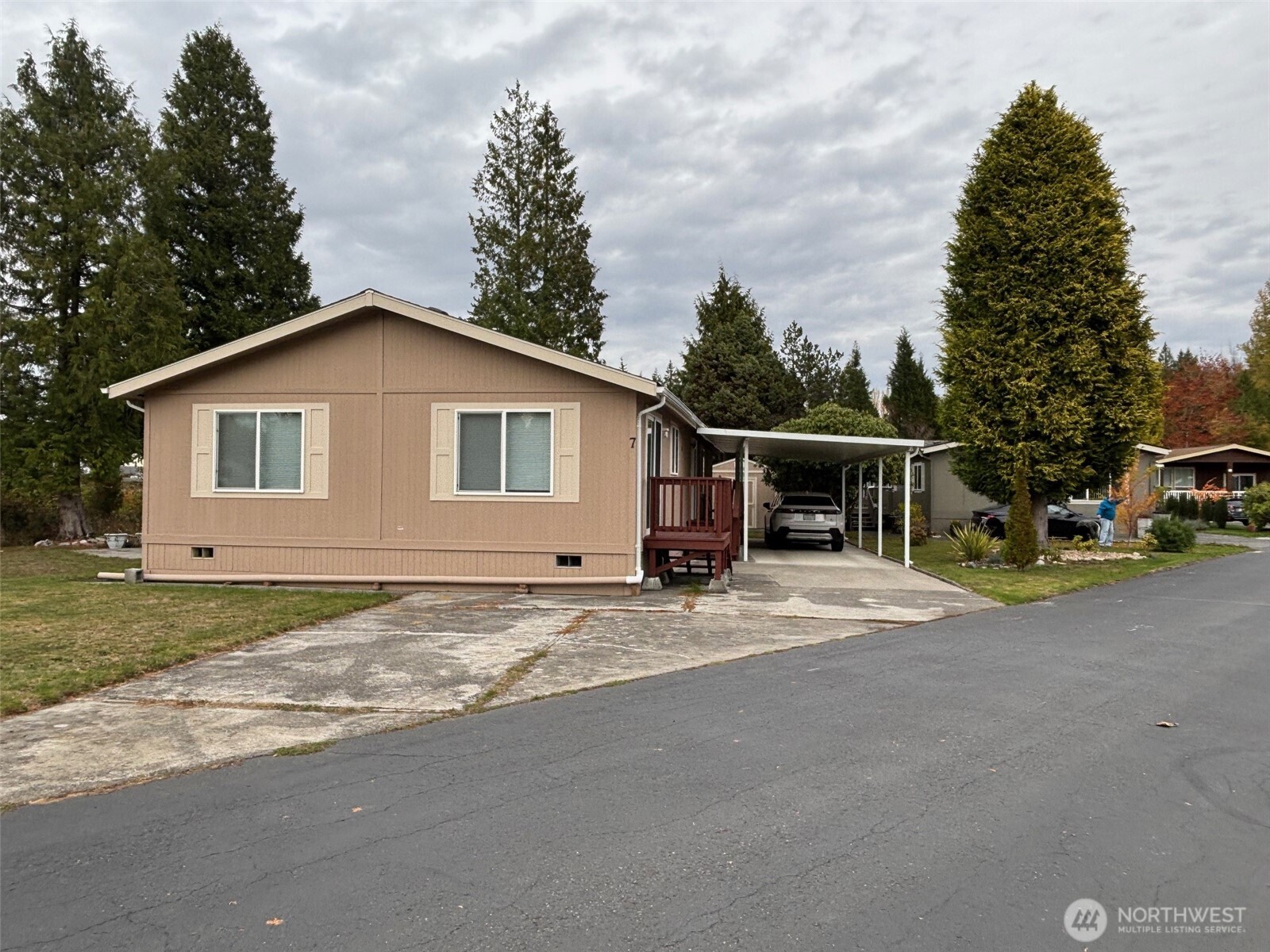 8370 Harborview Road, Unit 7 Blaine, WA 98230 - Photo 3 of 29 a view of a house with backyard and garden