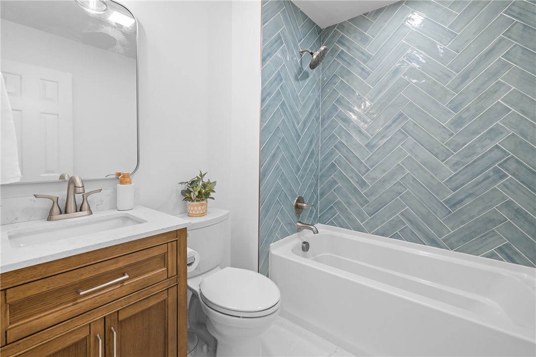 117 Riverpoint Drive Clemson, SC 29631 - Photo 29 of 47 This bathroom features a contemporary vanity and a tub-shower combination with a stylish tiled surround.
