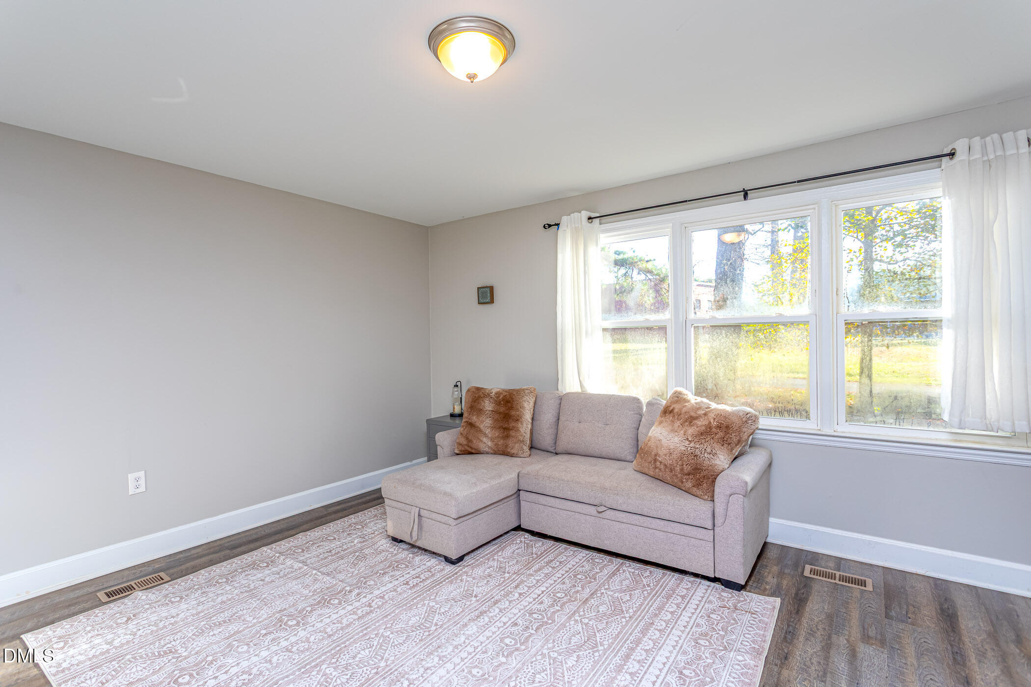10222 South Chestnut Street Middlesex, NC 27557 - Photo 13 of 21 Sunlit Living Room