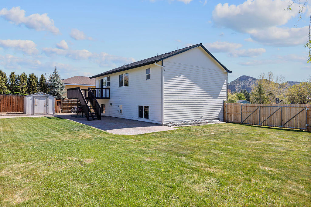 2979 Northeast Sugar Pine Road Prineville, OR 97754 - Photo 23 of 31 a view of an house with backyard and furniture