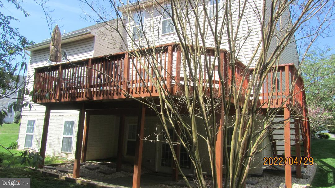 13812 Rockingham Road Germantown, MD 20874 - Photo 62 of 66 large deck and stone patio
