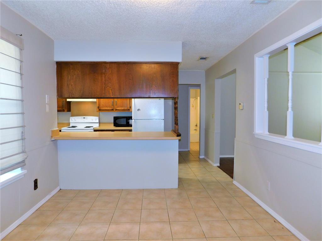 2716 Mill Pond Road Denton, TX 76209 - Photo 7 of 28