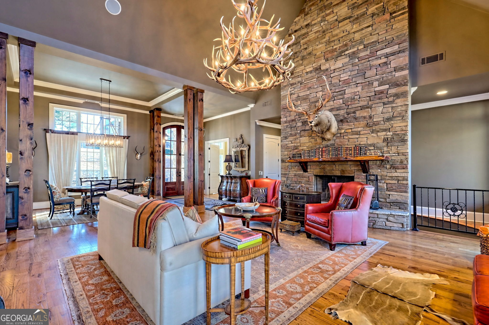 689 Waterfall Drive Clayton, GA 30525 - Photo 13 of 108 a living room with fireplace furniture and a rug