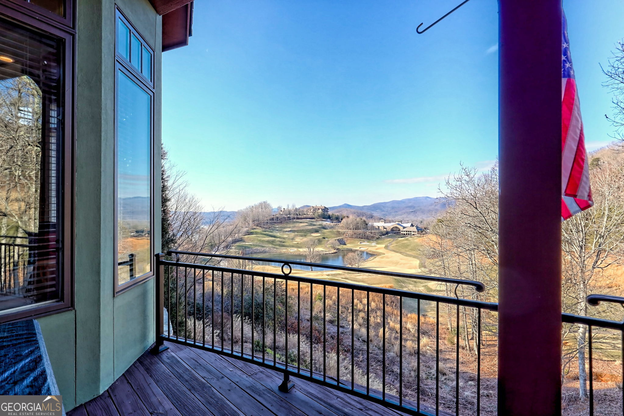 689 Waterfall Drive Clayton, GA 30525 - Photo 17 of 108 a view of a balcony with wooden floor and a floor to ceiling window