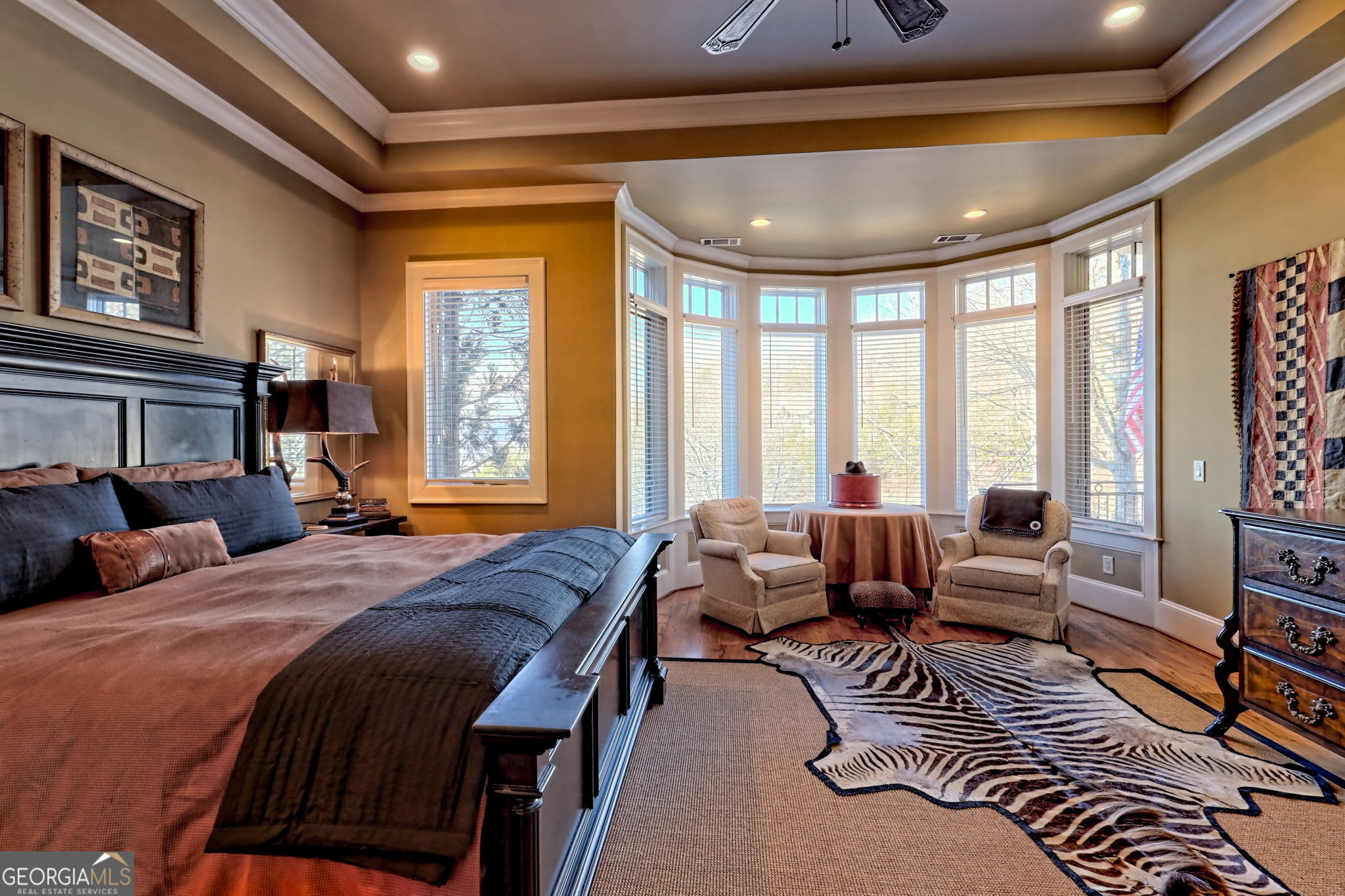 689 Waterfall Drive Clayton, GA 30525 - Photo 46 of 108 a bedroom with a bed and glass windows