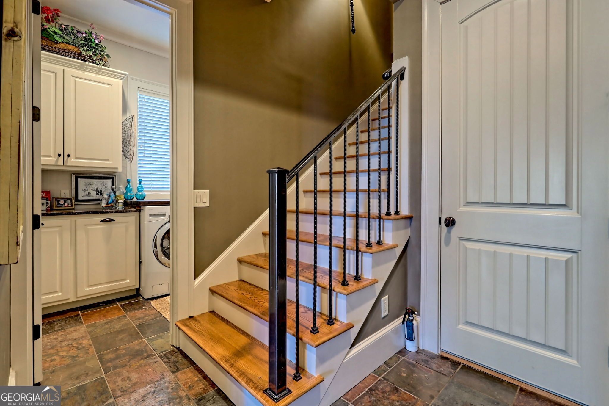 689 Waterfall Drive Clayton, GA 30525 - Photo 54 of 108 a view of a hallway with staircase