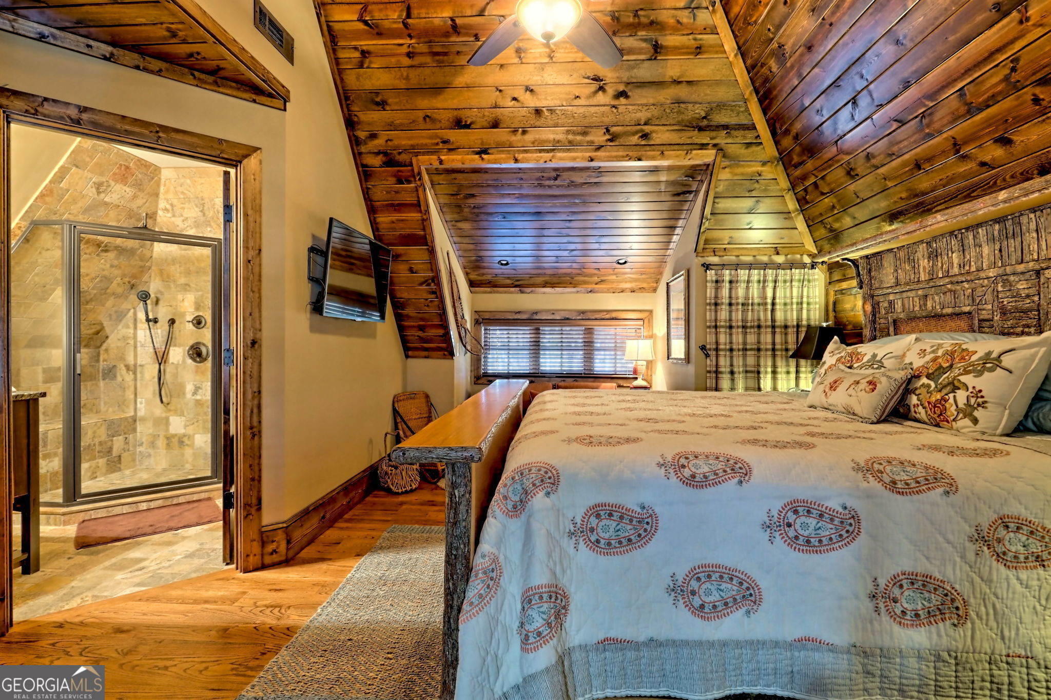 689 Waterfall Drive Clayton, GA 30525 - Photo 57 of 108 a bedroom with a bed and a window