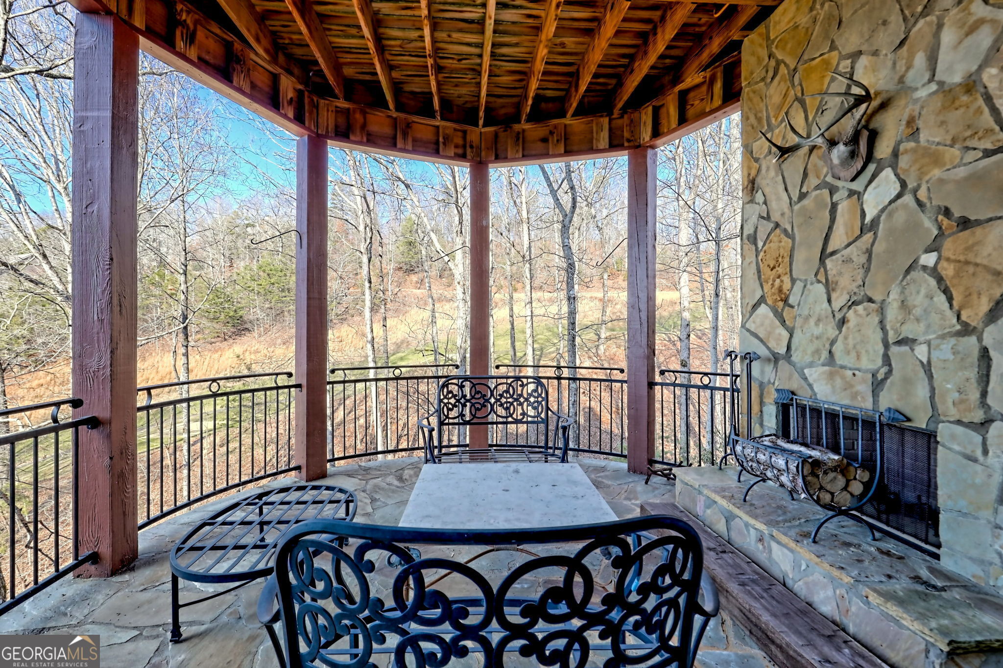 689 Waterfall Drive Clayton, GA 30525 - Photo 72 of 108 a dining room with furniture wooden floor and a potted plant
