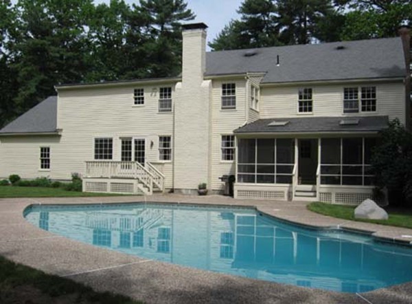 84 Fox Run Road Sudbury, MA 01776 - Photo 23 of 26 a front view of a house with a yard