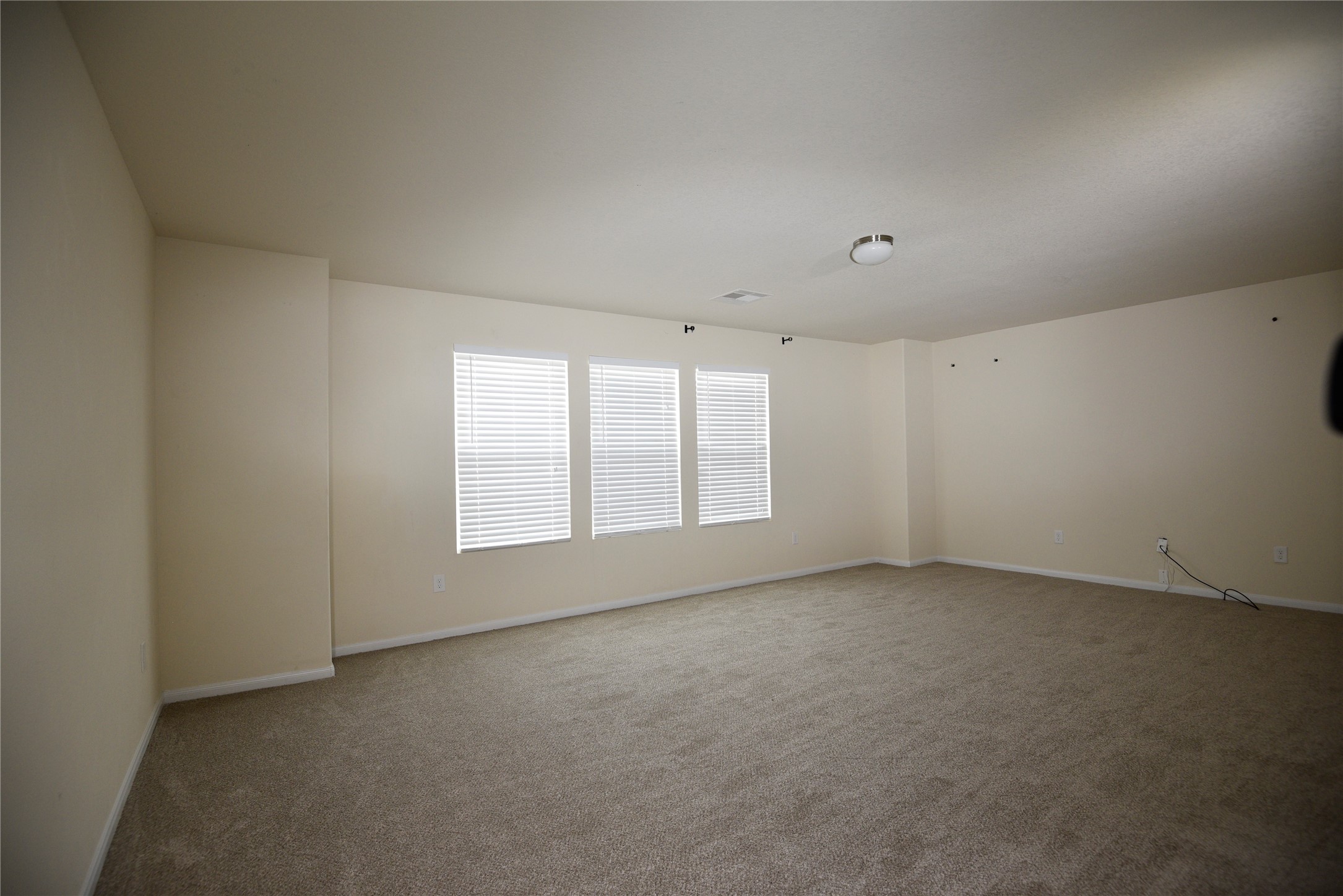 9997 Hyacinth Way Conroe, TX 77385 - Photo 30 of 45 a view of an empty room with a window