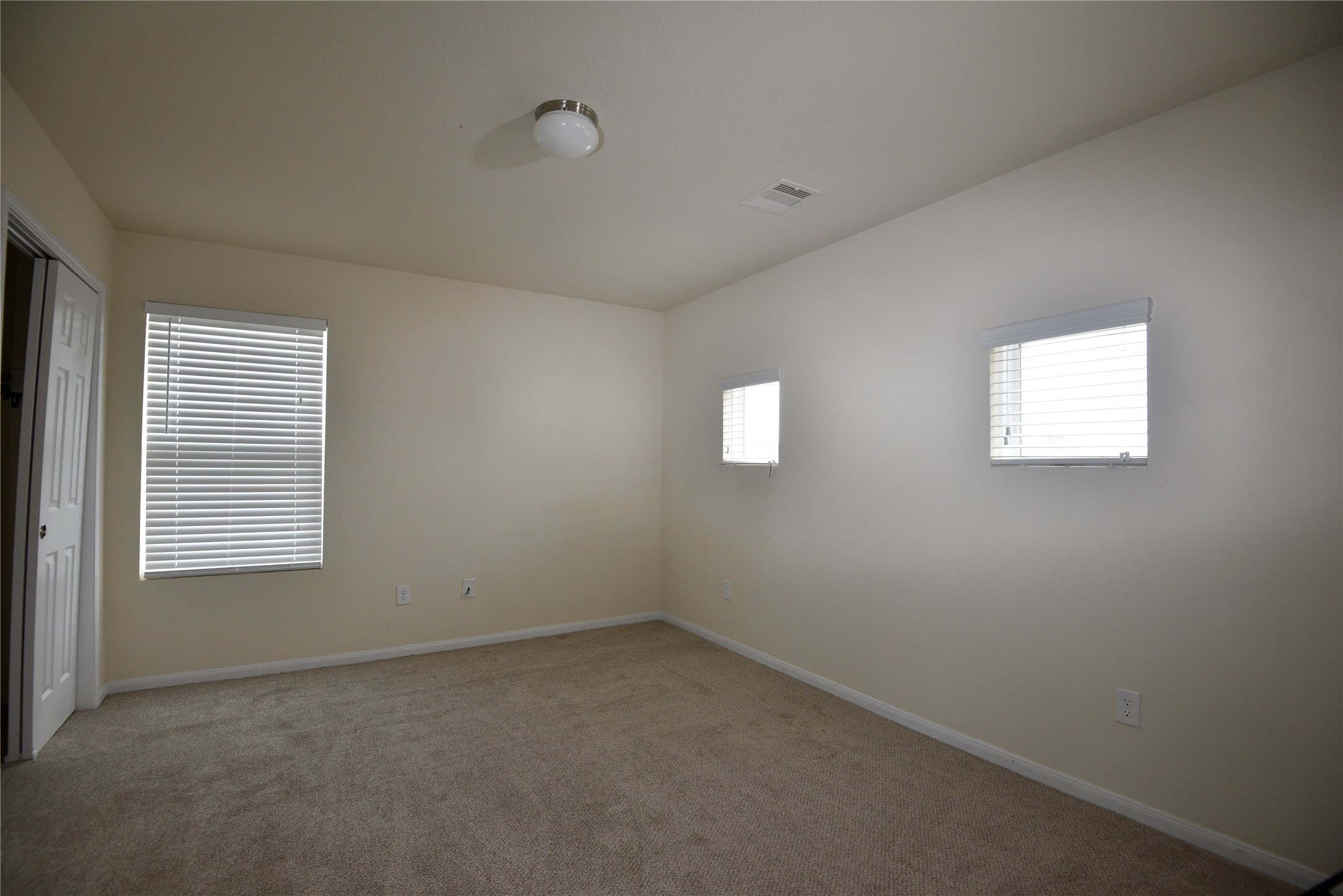 9997 Hyacinth Way Conroe, TX 77385 - Photo 38 of 45 an empty room with a window