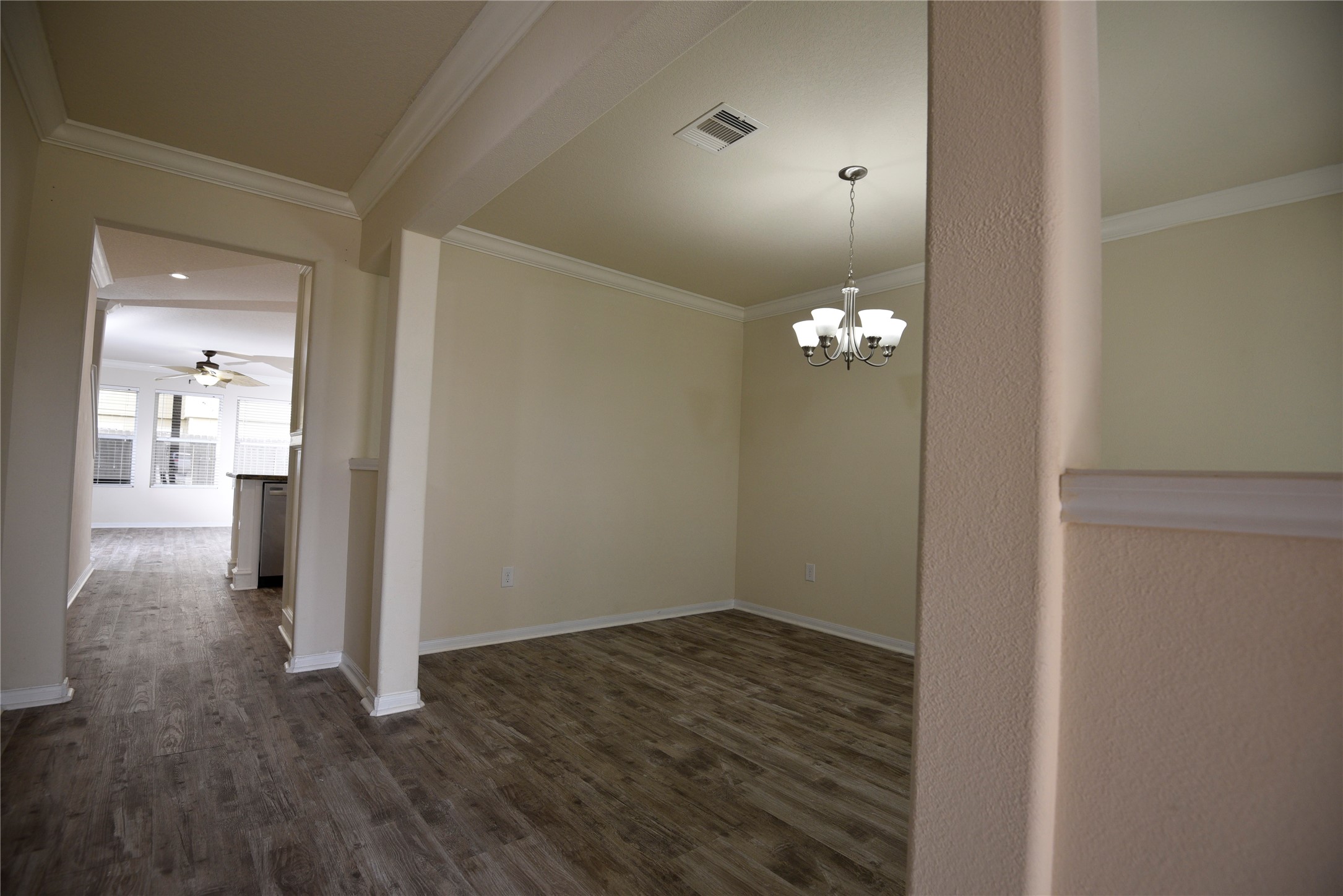 9997 Hyacinth Way Conroe, TX 77385 - Photo 10 of 45 a view of a livingroom with wooden floor