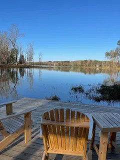 a view of a lake with a outdoor space