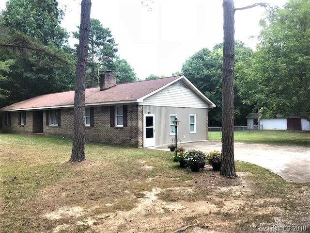 2426 New Cut Church Road Lancaster, SC 29720 - Photo 3 of 28 a front view of a house with a yard and garage