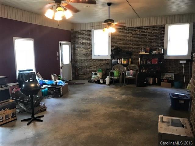 2426 New Cut Church Road Lancaster, SC 29720 - Photo 26 of 28 a living room with furniture and a fireplace