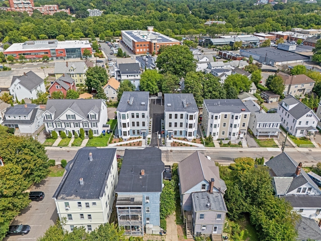 40 Waverly Street, Unit 2 Boston, MA 02135 - Photo 5 of 7 an aerial view of residential houses with outdoor space and parking