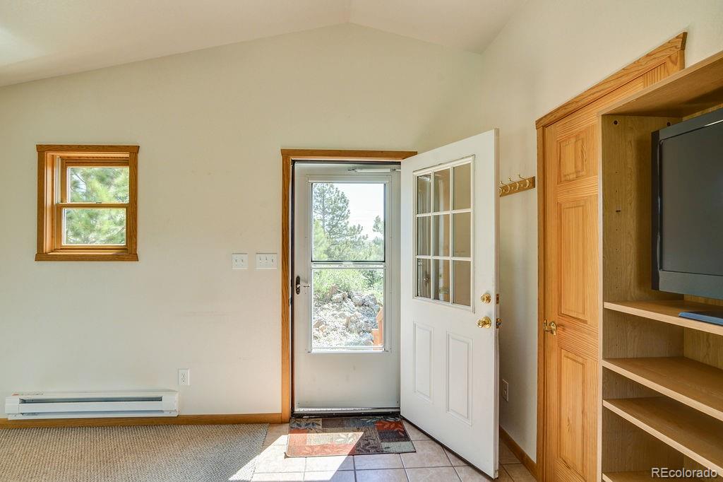 681 Forge Road Hartsel, CO 80449 - Photo 24 of 41 a view of an entryway with wooden floor