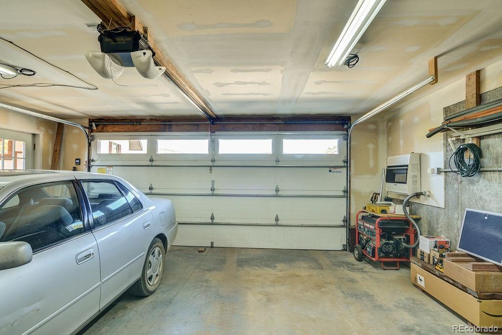 681 Forge Road Hartsel, CO 80449 - Photo 31 of 41 a utility room with multiple dryer and washer