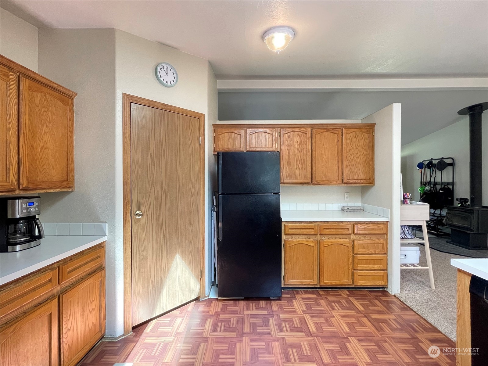 1010 Lemmon Road Port Angeles, WA 98362 - Photo 16 of 40 a kitchen with stainless steel appliances granite countertop a refrigerator and a sink
