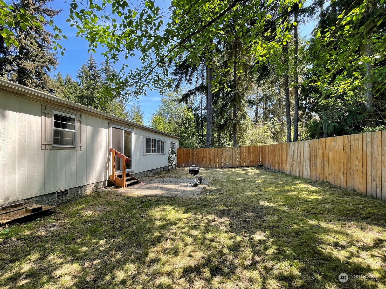 1010 Lemmon Road Port Angeles, WA 98362 - Photo 36 of 40 a backyard of a house with seating space