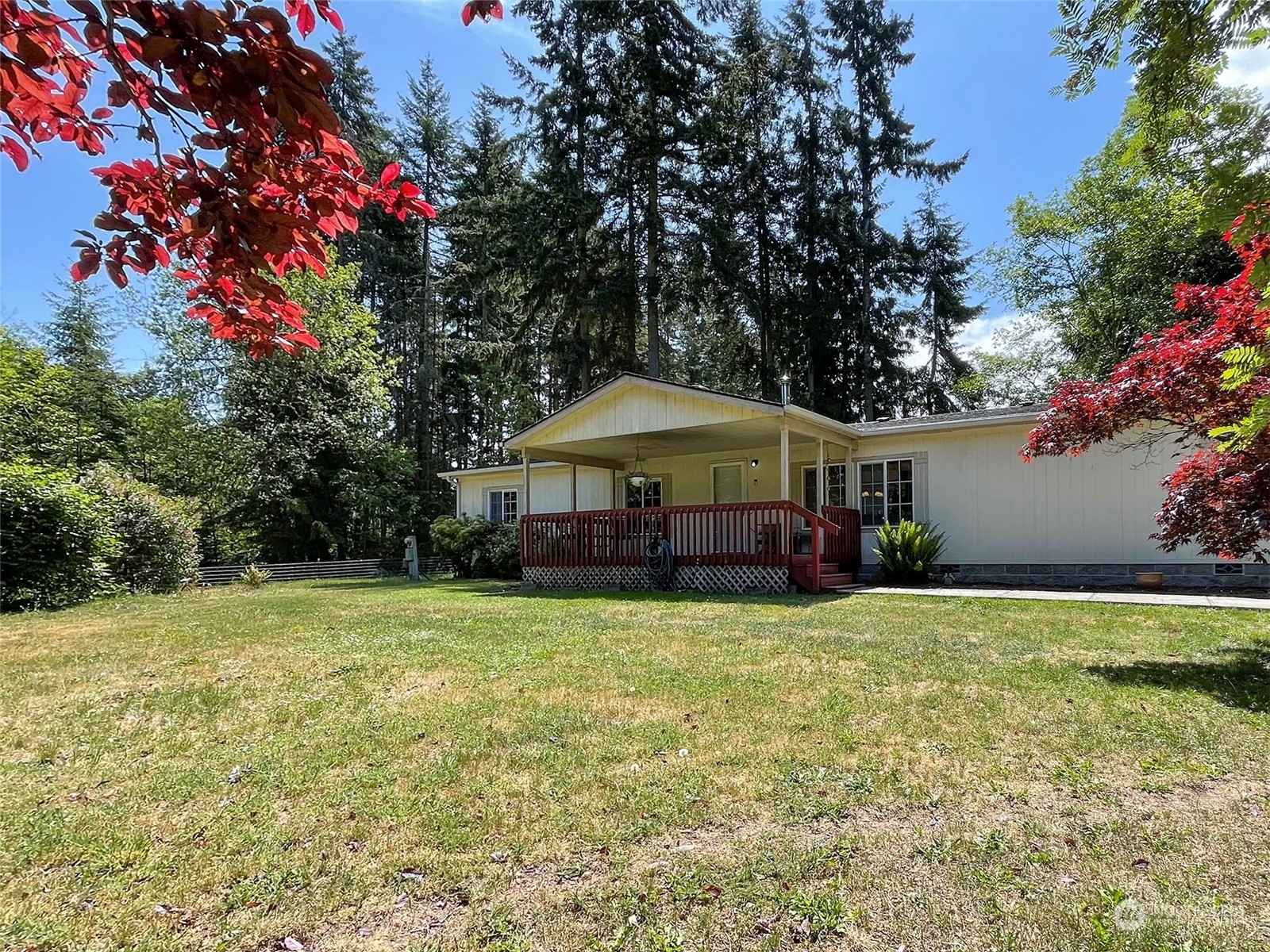 1010 Lemmon Road Port Angeles, WA 98362 - Photo 4 of 40 a house view with a sitting space and garden