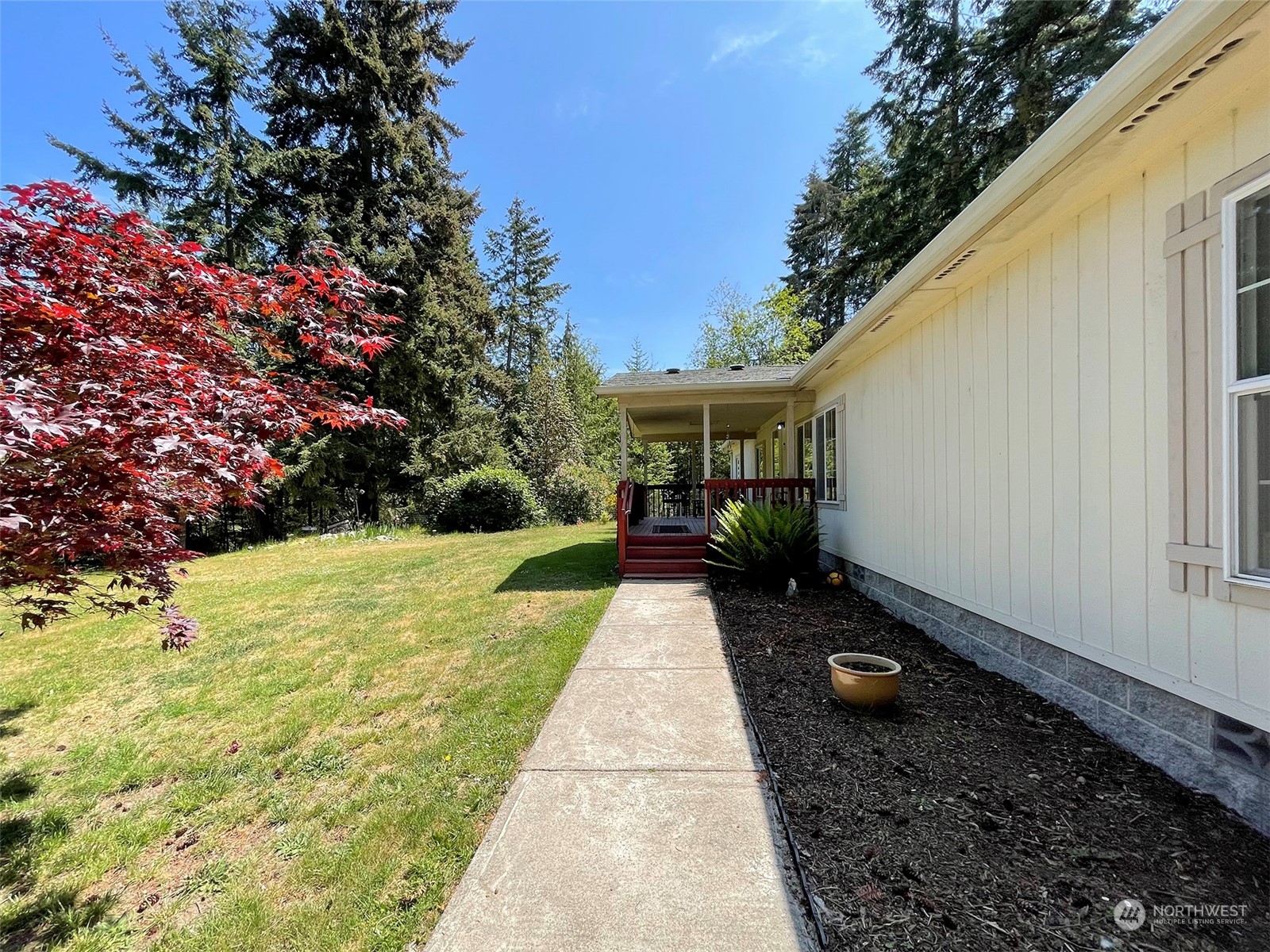 1010 Lemmon Road Port Angeles, WA 98362 - Photo 5 of 40 a view of back yard of the house