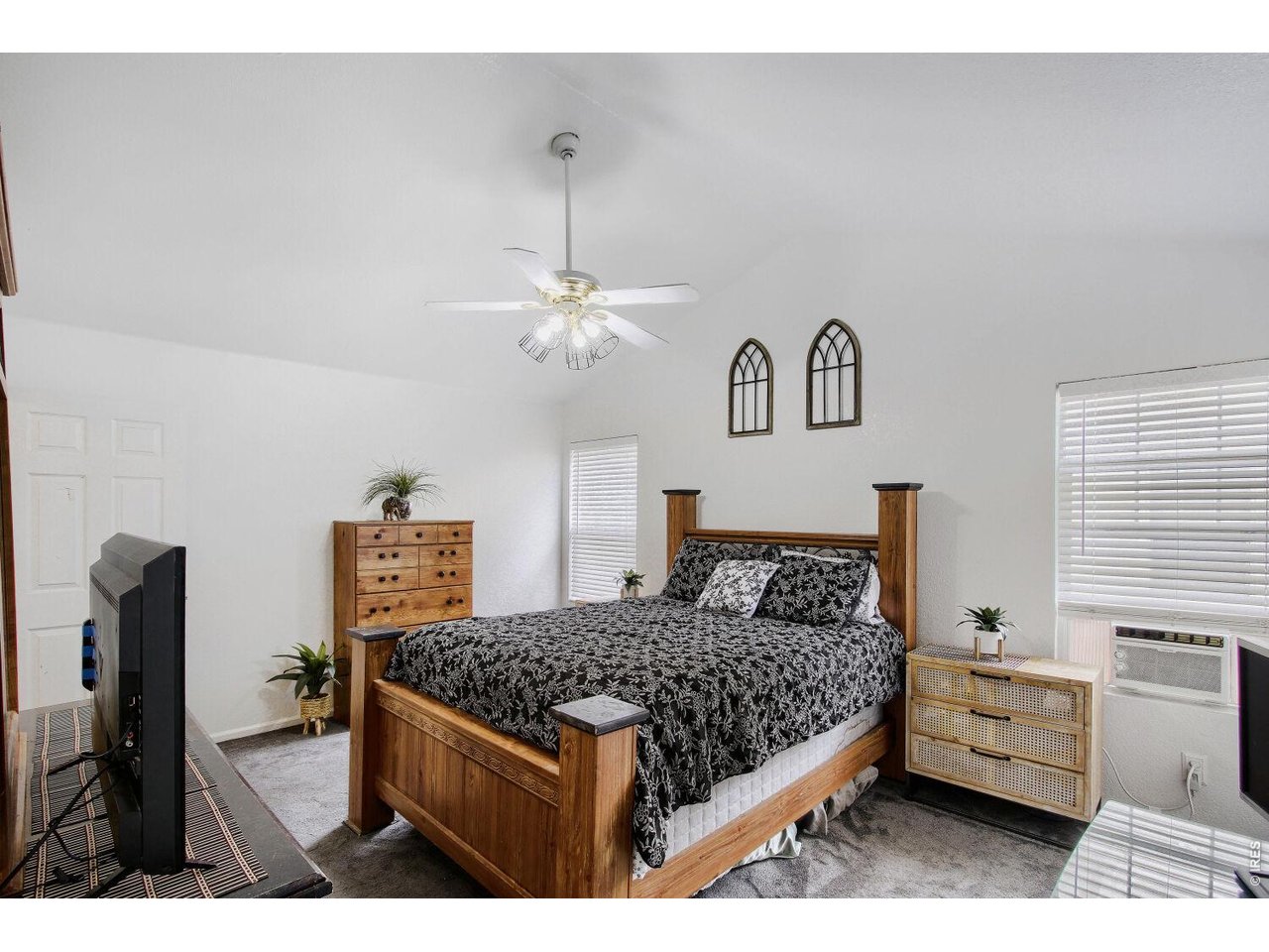 4775 Flower Street Wheat Ridge, CO 80033 - Photo 12 of 18 Primary Bedroom Vaulted Ceilings