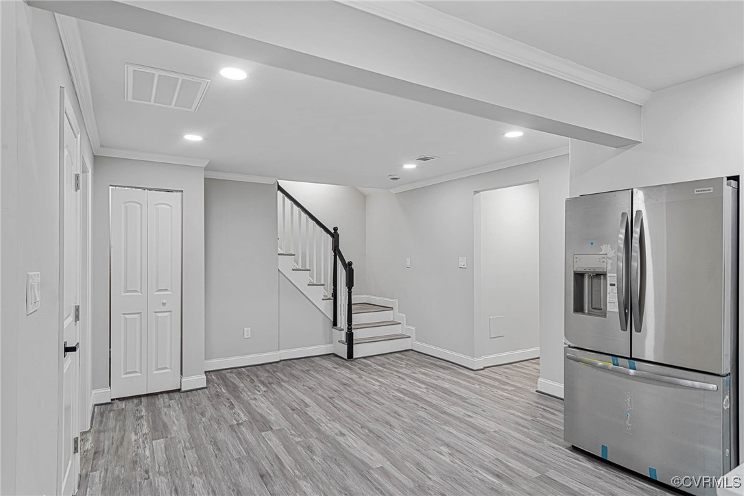 15412 Moores Mill Road Ruther Glen, VA 22546 - Photo 12 of 31 a view of a kitchen with a refrigerator and wooden floor