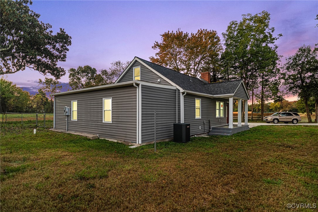 15412 Moores Mill Road Ruther Glen, VA 22546 - Photo 2 of 31 a view of a house with a yard