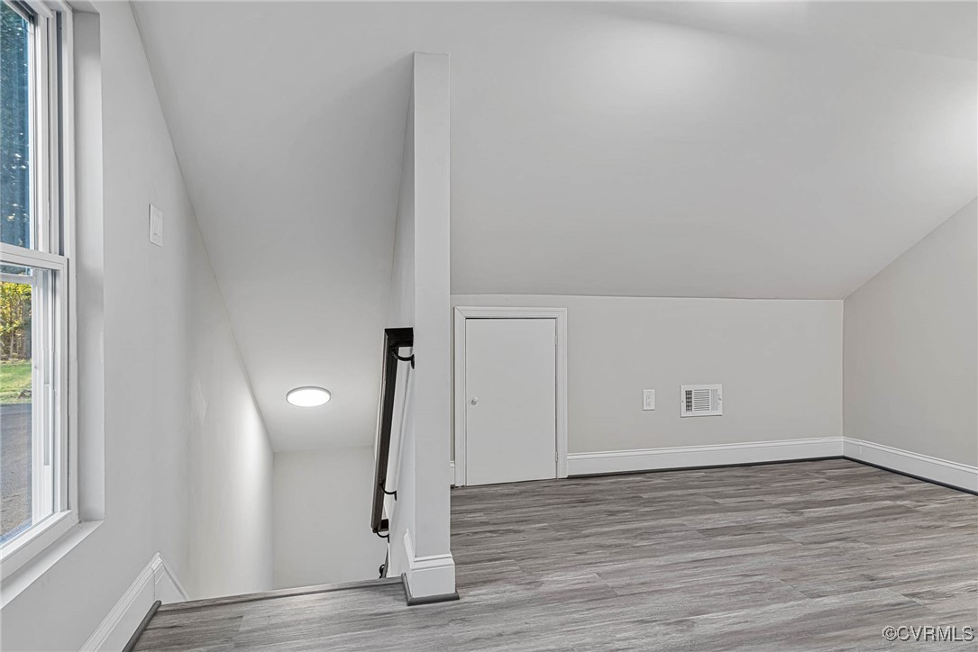 15412 Moores Mill Road Ruther Glen, VA 22546 - Photo 25 of 31 a view of an empty room and wooden floor