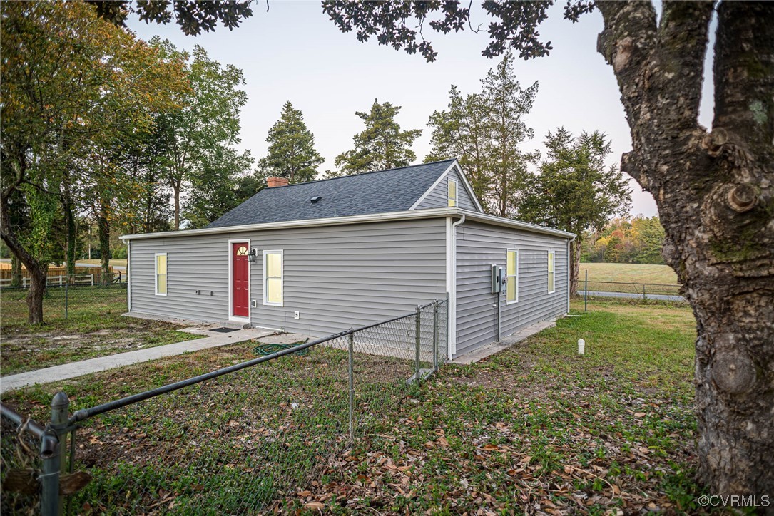 15412 Moores Mill Road Ruther Glen, VA 22546 - Photo 4 of 31 a view of backyard of house with wooden fence