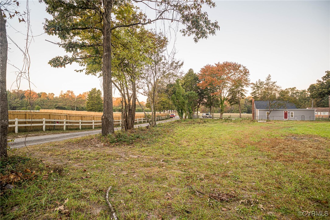 15412 Moores Mill Road Ruther Glen, VA 22546 - Photo 6 of 31 a view of outdoor space with deck and trees