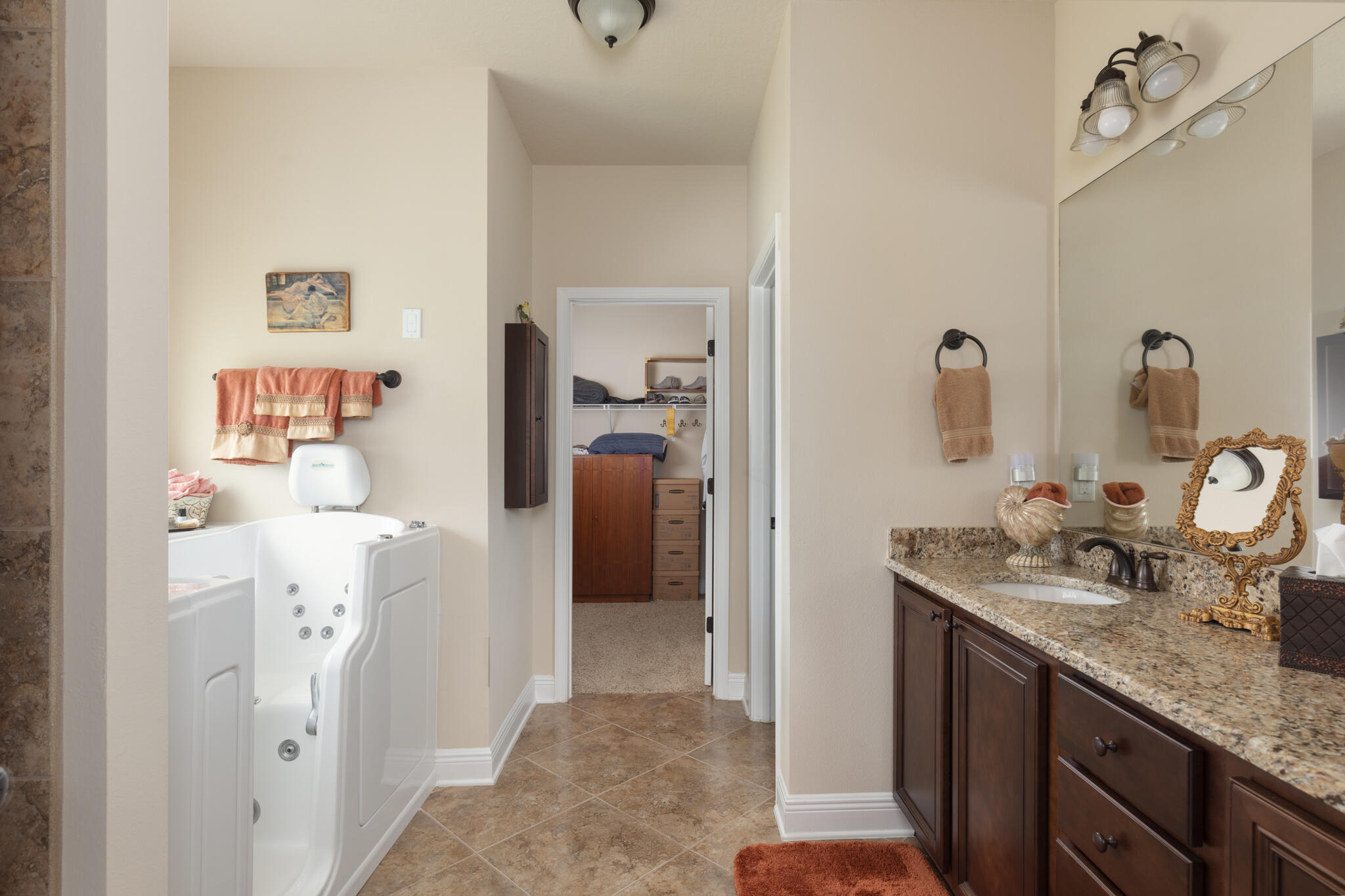 3379 Citrine Circle Crestview, FL 32539 - Photo 19 of 33 a bathroom with a sink vanity and mirror