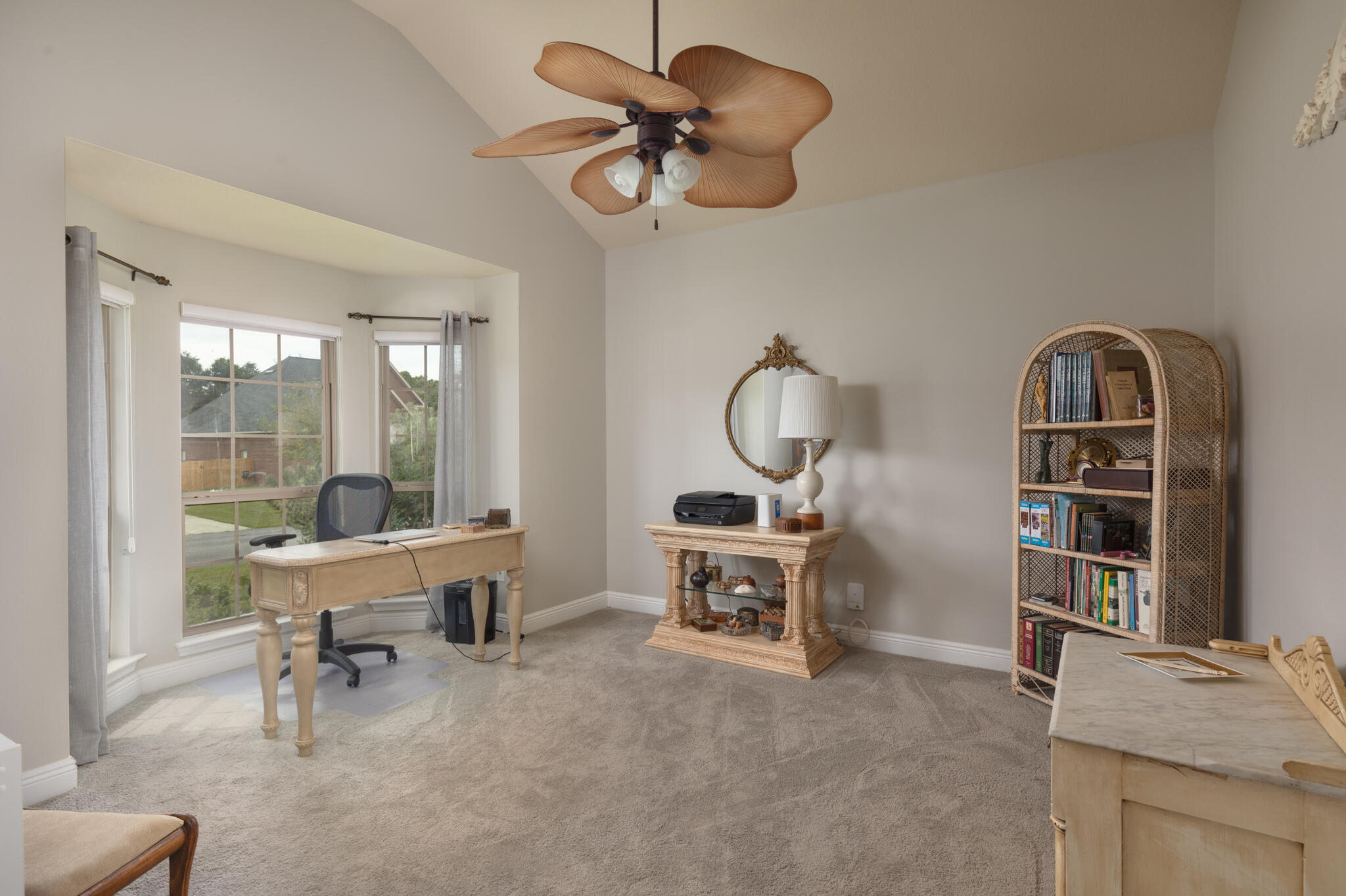 3379 Citrine Circle Crestview, FL 32539 - Photo 21 of 33 a living room with furniture a chandelier and a window