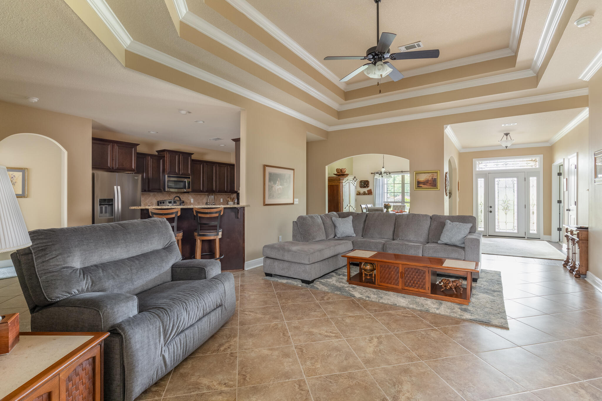 3379 Citrine Circle Crestview, FL 32539 - Photo 4 of 33 a living room with furniture and a chandelier