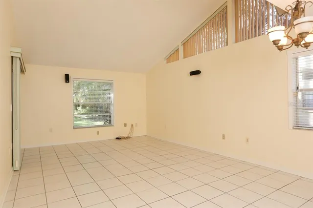 a view of an empty room and window