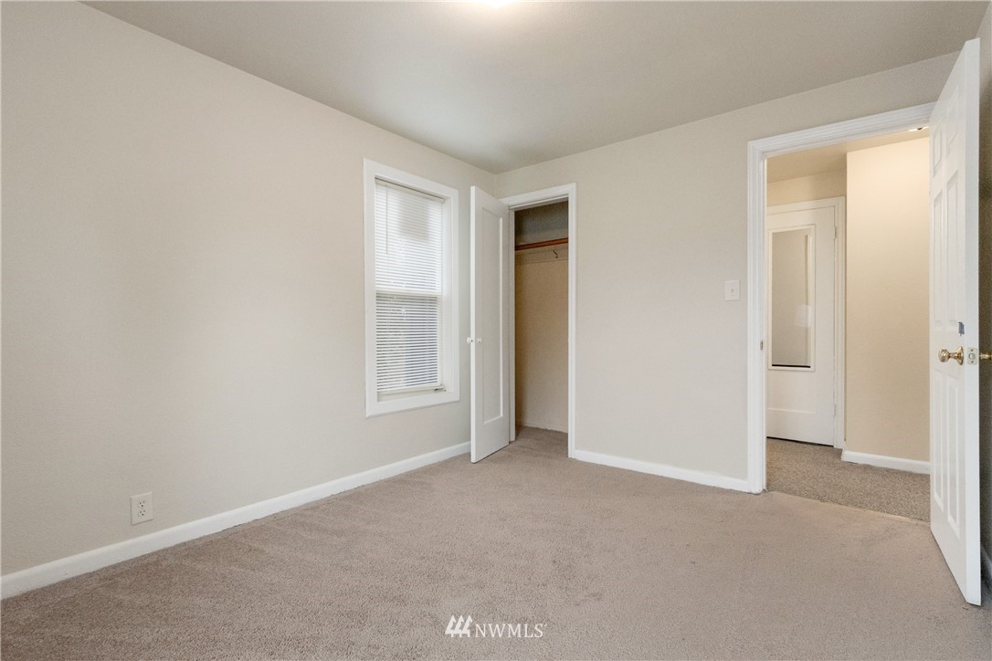 10651 Rustic Road South Seattle, WA 98178 - Photo 14 of 34 a view of an empty room and closet area