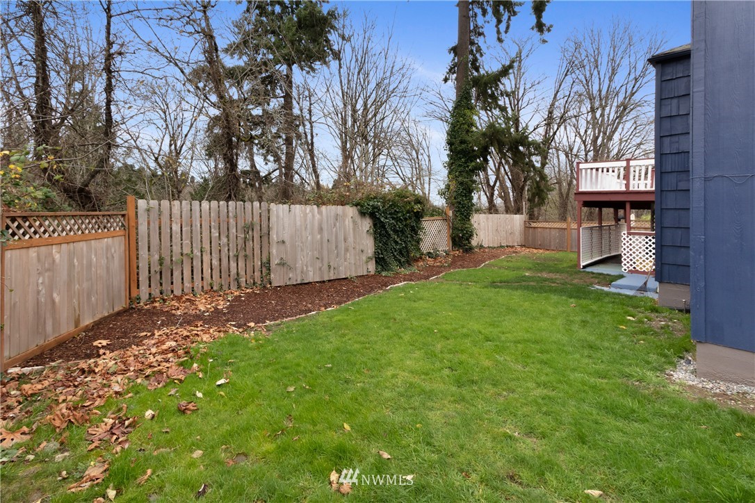 10651 Rustic Road South Seattle, WA 98178 - Photo 34 of 34 a view of a backyard with a garden