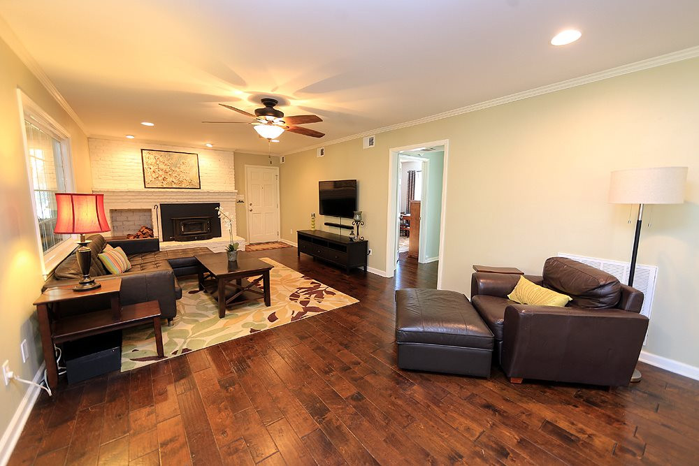 4305 Oak Park Road Raleigh, NC 27612 - Photo 11 of 18 This fireplace family room flows from the kitchen. It has room for the whole Super Bowl crowd! Den/Family/Great Room