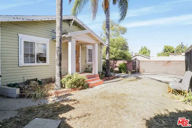 a view of a house with a patio