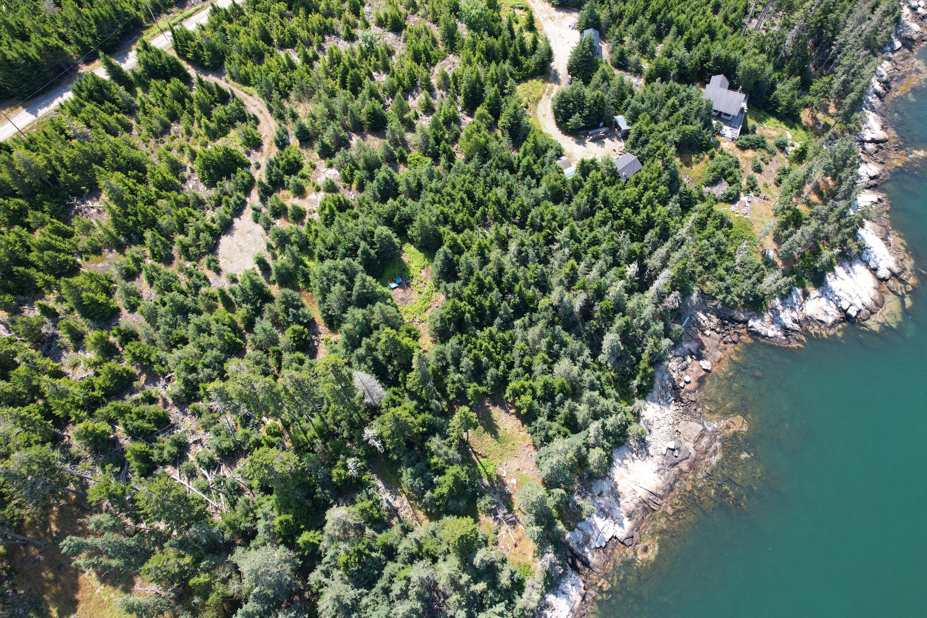 Lot 9 Jericho Bay Road Swans Island, ME 04685 - Photo 6 of 10 looking down with neighbors house