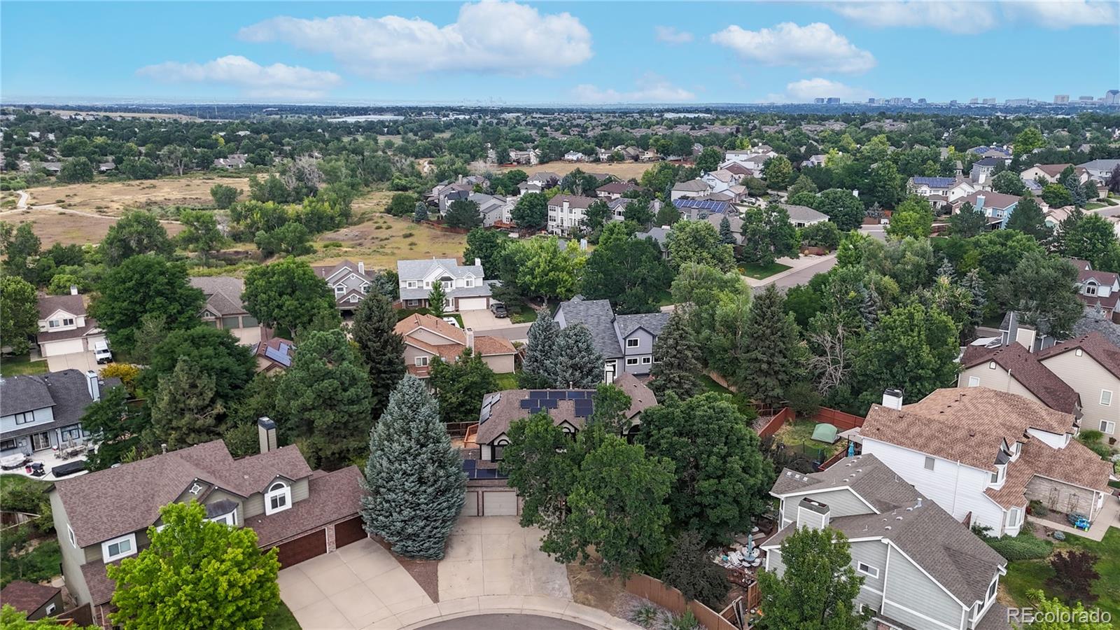 6265 Cornell Court Highlands Ranch, CO 80130 - Photo 36 of 41 an aerial view of a city with lots of residential buildings