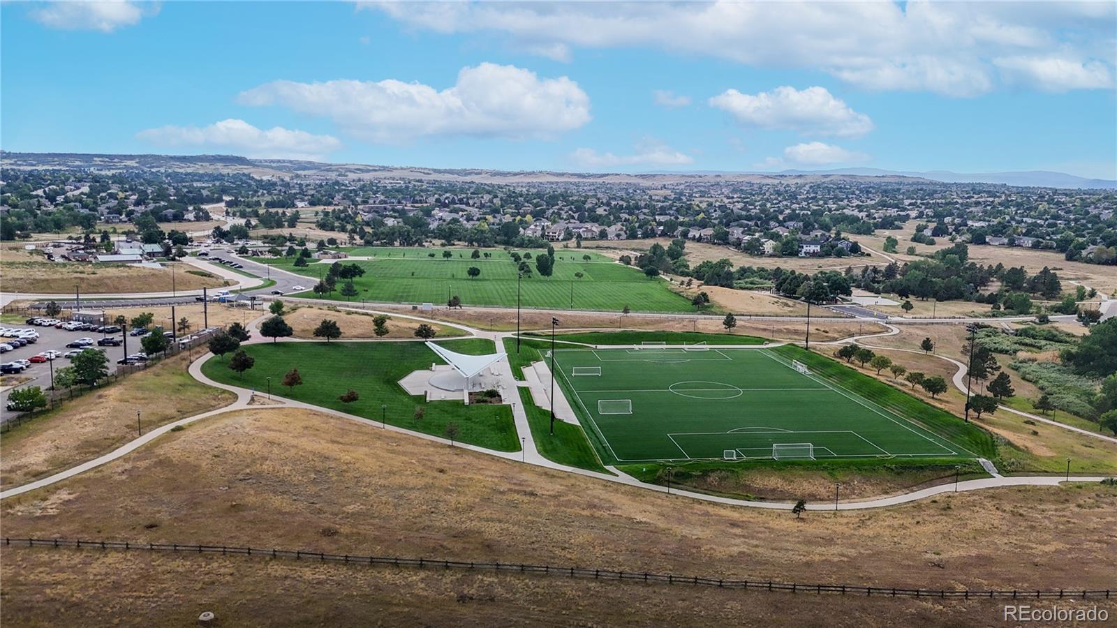 6265 Cornell Court Highlands Ranch, CO 80130 - Photo 38 of 41 an aerial view of a city with lots of residential buildings