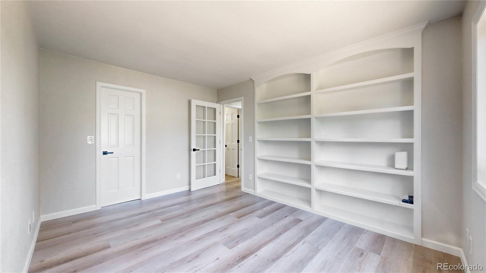 6265 Cornell Court Highlands Ranch, CO 80130 - Photo 10 of 41 a view of a room with empty racks